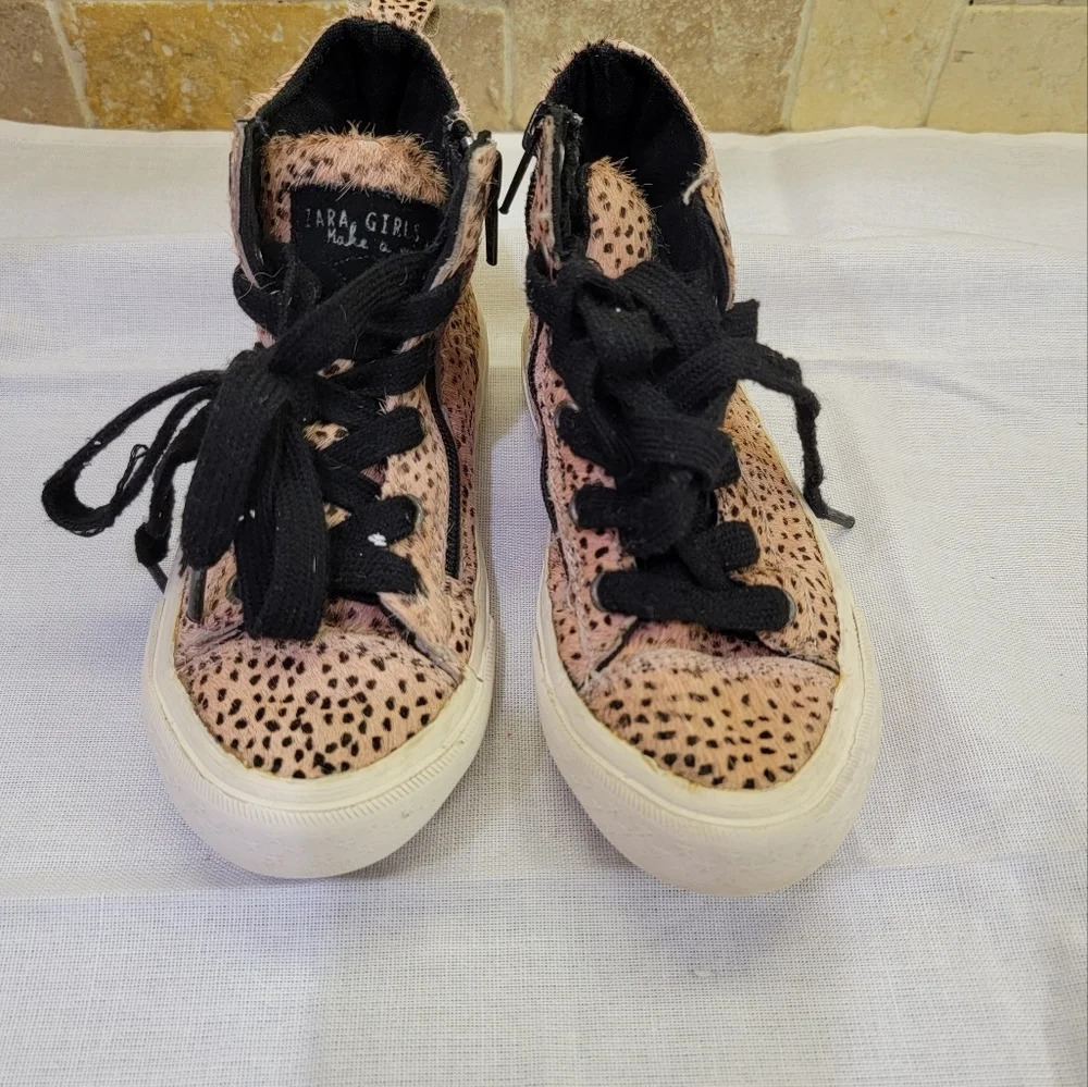 Zara girls calf hair high top pink spotted sneakers.